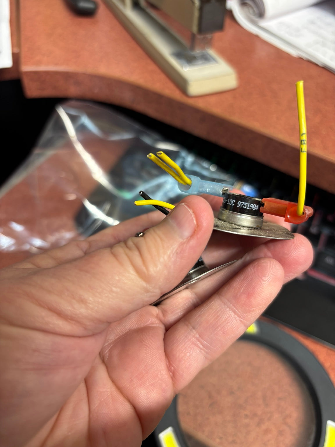 Actual cooling fan thermostat showing original number 9751984