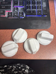 Original actual used white knobs showing cosmetic condition; sold individually