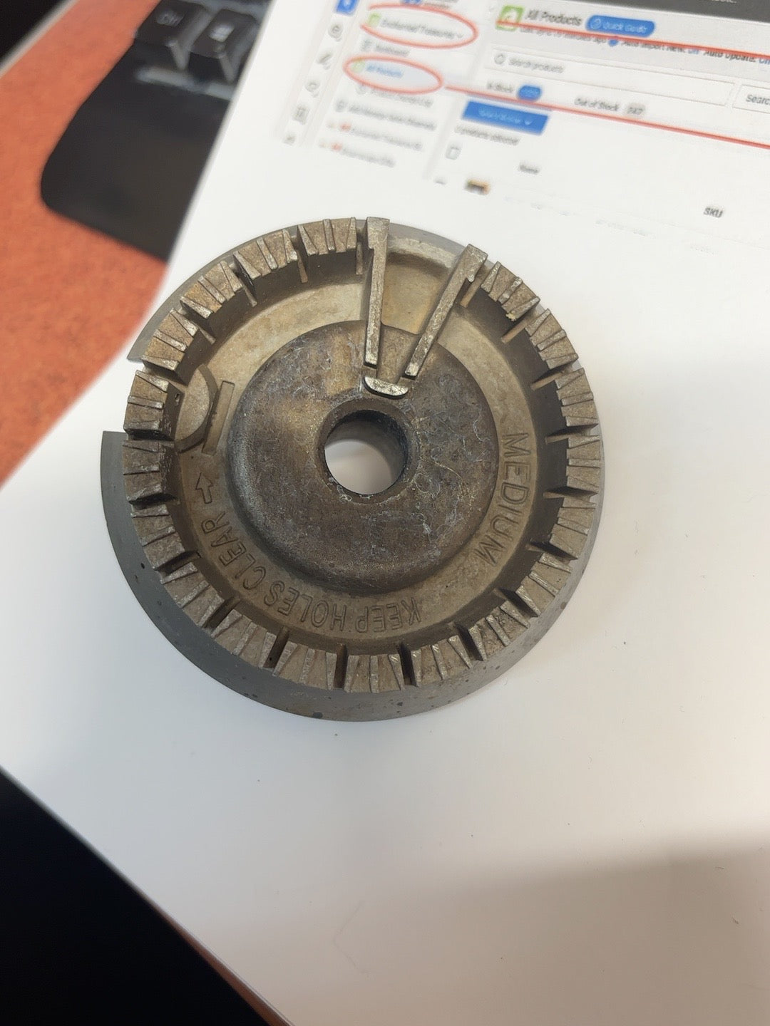 Used medium gas stove burner head, top view; cap not included