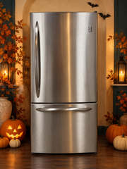 GE stainless steel bottom-freezer refrigerator with Halloween decor