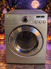 LG 27-inch grey front load dryer on purple Halloween background